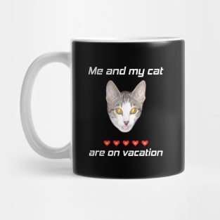 Me and my cat are on vacation Mug